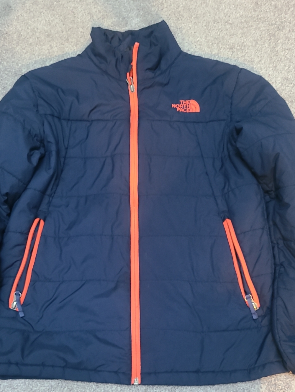 The North Face Navy Blue Jacket with Orange Trim